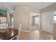 View into the living room from the dining area at 3694 Lakewood Blvd, North Port, FL 34287