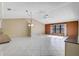 Spacious dining area with tile floors and adjoining kitchen at 510 Pendleton Pl, Venice, FL 34292