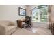 Home office with built-in desk and window views at 515 Governors Green Dr, Venice, FL 34293