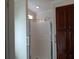 Bathroom with shower and built-in cabinets at 657 N Green Cir, Venice, FL 34285