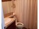 Clean bathroom with shower, toilet, and vanity at 657 N Green Cir, Venice, FL 34285