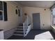 Exterior view showing steps leading to the entrance at 657 N Green Cir, Venice, FL 34285