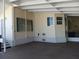 Exterior view of the house and carport at 657 N Green Cir, Venice, FL 34285