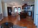 Kitchen features dark wood cabinets and an island at 657 N Green Cir, Venice, FL 34285