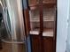 Organized kitchen pantry with pull-out shelves at 657 N Green Cir, Venice, FL 34285