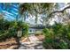 Entrance to tennis courts with lush landscaping and signage at 752 Pine Run Dr, Osprey, FL 34229