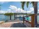 Private dock with seating, perfect for fishing at 922 Casey Cove Dr, Nokomis, FL 34275