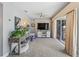 Living room with a view of the pool and patio area at 922 Casey Cove Dr, Nokomis, FL 34275