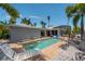 Refreshing pool with adjacent spa and lounge chairs at 922 Casey Cove Dr, Nokomis, FL 34275