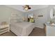 Guest bedroom with white bedding and a coastal theme at 11679 Anhinga Ave, Venice, FL 34292