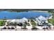 Two white community buildings near a lake at 11679 Anhinga Ave, Venice, FL 34292