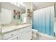 Clean bathroom, featuring granite countertops and a tub shower combo at 12313 Amica Loop, Venice, FL 34293
