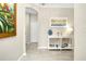 Bright and airy entryway with decorative console table at 12313 Amica Loop, Venice, FL 34293