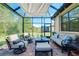 Covered patio with seating area and view of backyard at 12313 Amica Loop, Venice, FL 34293