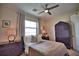 Guest bedroom with water views, a queen bed, and ample storage at 140 Maraviya Blvd, Nokomis, FL 34275