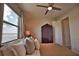 Bedroom with water views, a queen bed, and ample storage at 140 Maraviya Blvd, Nokomis, FL 34275
