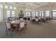 Elegant community room with tables and chairs at 140 Maraviya Blvd, Nokomis, FL 34275