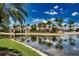 Luxury community with lakefront views and lush landscaping at 140 Maraviya Blvd, Nokomis, FL 34275