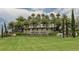 Toscana Isles entrance sign with lush landscaping at 140 Maraviya Blvd, Nokomis, FL 34275