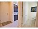 Laundry room with washer, dryer, utility sink, and powder room at 140 Maraviya Blvd, Nokomis, FL 34275