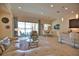 Spacious living area with water views, sectional sofa, and dining area at 140 Maraviya Blvd, Nokomis, FL 34275