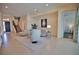 Light and airy living room with contemporary furniture and large windows at 140 Maraviya Blvd, Nokomis, FL 34275