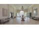 Elegant community clubhouse lobby with high ceilings and water views at 140 Maraviya Blvd, Nokomis, FL 34275
