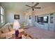 Open loft area includes a sitting area and TV at 140 Maraviya Blvd, Nokomis, FL 34275
