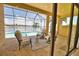 Relaxing pool and patio area with lake views at 140 Maraviya Blvd, Nokomis, FL 34275