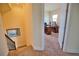 Upstairs hallway with access to office and loft at 140 Maraviya Blvd, Nokomis, FL 34275