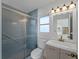 Bathroom featuring a modern vanity, toilet, and glass shower stall at 1678 Quail Lake Dr, Venice, FL 34293
