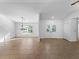 Bright dining room with tile floors and chandelier at 1678 Quail Lake Dr, Venice, FL 34293