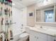 Clean bathroom with shower/tub combo and updated vanity at 200 The Esplanade N # A7, Venice, FL 34285