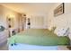 Spacious Primary bedroom with large bed and ample closet space at 200 The Esplanade N # A7, Venice, FL 34285