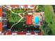 Aerial view showing building, pool, and landscaping at 21405 Olean Blvd # 404, Port Charlotte, FL 33952