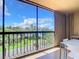Balcony offering scenic view of landscape and partial water view at 21405 Olean Blvd # 404, Port Charlotte, FL 33952