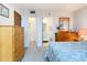 Bedroom with ensuite bathroom and ample closet space, dresser and a bed at 21405 Olean Blvd # 404, Port Charlotte, FL 33952