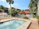 Relaxing community hot tub with surrounding tile at 21405 Olean Blvd # 404, Port Charlotte, FL 33952