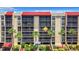Condo building aerial view, red roof at 21405 Olean Blvd # 404, Port Charlotte, FL 33952