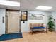 Welcoming lobby with seating area and elevator access at 21405 Olean Blvd # 404, Port Charlotte, FL 33952