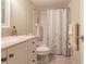 Clean bathroom with a shower/tub combo and vanity at 2260 Stickney Point Rd # 303, Sarasota, FL 34231