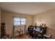 Bright bedroom with a window and a workspace at 2260 Stickney Point Rd # 303, Sarasota, FL 34231