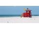 Lifeguard stand on a pristine beach at 2240 Stickney Point Rd # 213, Sarasota, FL 34231
