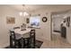 Condo dining area features a small table and kitchen pass-through at 2240 Stickney Point Rd # 213, Sarasota, FL 34231