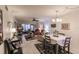 Bright dining area with a table and chairs overlooking the living room at 2240 Stickney Point Rd # 213, Sarasota, FL 34231