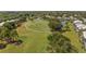 Golf course and residential area aerial view at 324 Wexford Ter # 171, Venice, FL 34293