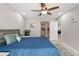 Bright bedroom with a comfy bed and ensuite bathroom access at 324 Wexford Ter # 171, Venice, FL 34293