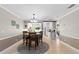 Dining area with table and chairs near kitchen at 324 Wexford Ter # 171, Venice, FL 34293