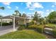 Single story home with carport and lush landscaping at 324 Wexford Ter # 171, Venice, FL 34293