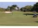 Golf course with players and golf cart at 324 Wexford Ter # 171, Venice, FL 34293